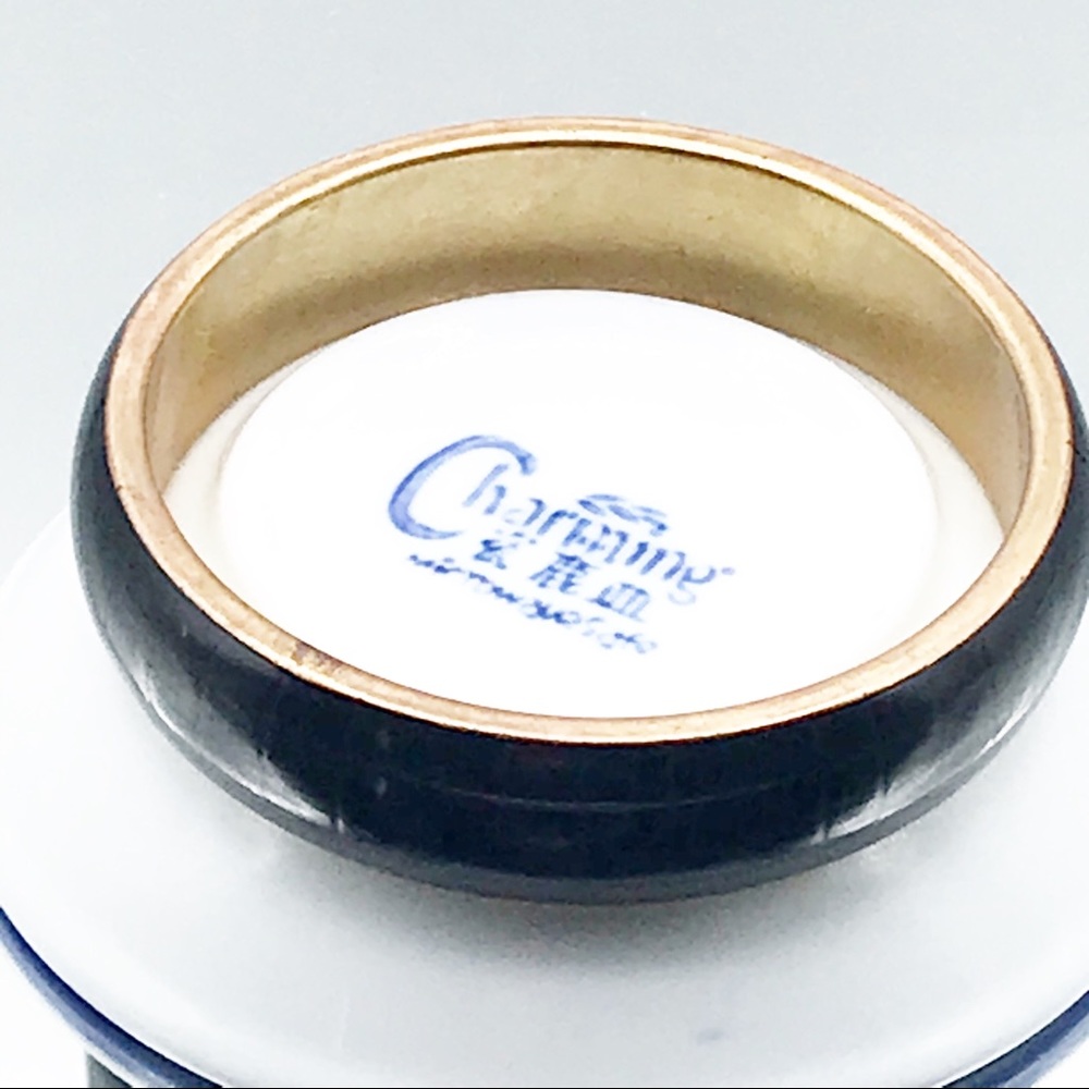 ACRYLIC AND BRASS BANGLE WITH STRIPE PATTERN